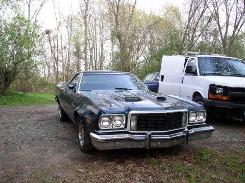 1973 Ford Ranchero - This 1973 Ford Ranchero features a distinctive grille and dual hood scoops.