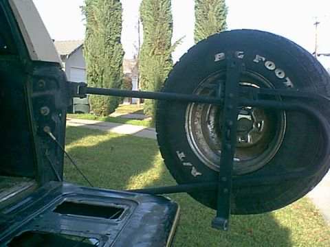 1983 Ford Bronco - This is the spare that came with the bronco. and here is what the back of the tire rack.