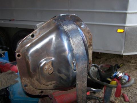 1995 Ford Bronco - A close-up view of a differential cover, possibly modified with a welded bracket.