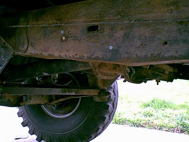 hereis the new marked holes on the driver side frame rail.