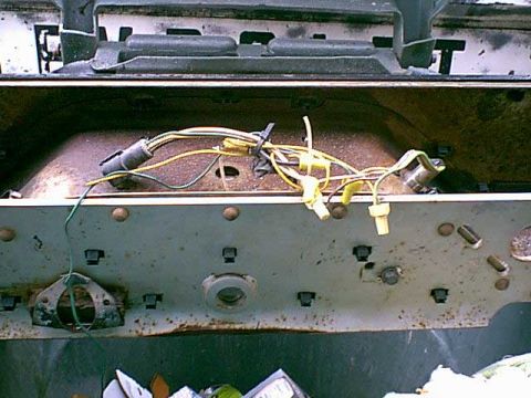 1983 Ford Bronco - here is the wiring mess behind the rear bumper. time to clean it up.