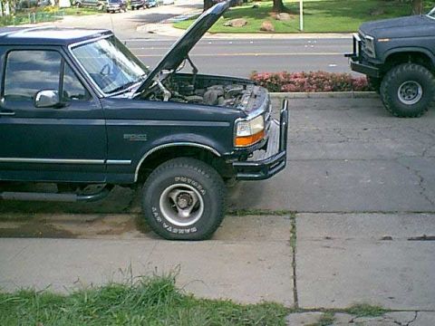 1983 Ford Bronco - lift in and front bumper adjusted.