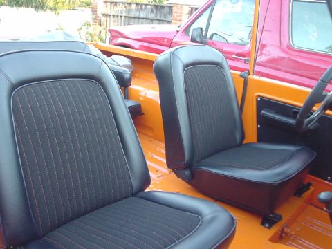 1977 Ford Bronco - Interior view of a 1977 Ford Bronco, showing the front seats and dashboard area.