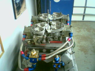 1978 Ford Bronco - This is a close-up of a performance carburetor setup, likely for a racing or modified vehicle.