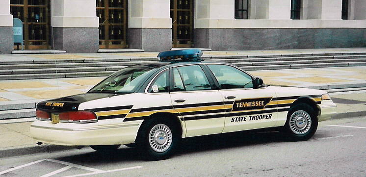 1996 Ford Crown Victoria Tennessee State Trooper car, rear 3/4 view