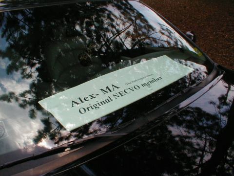 1997 Ford Crown Victoria - A sign is placed on the windshield of a black car, obscuring the view of the interior.