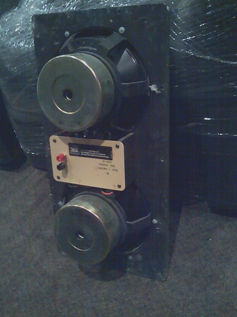 2006 Ford E350 - Speaker component with two drivers and a terminal block is shown.