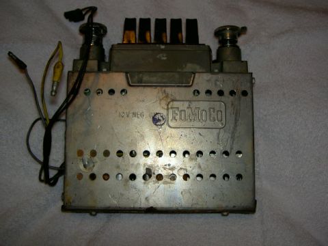 1967 Ford Ranchero - This is a vintage Ford car radio, identified by the FoMoCo logo and 12V NEG marking.