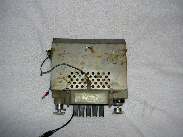 Old car radio with wires and knobs