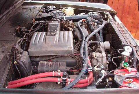 1975 Ford Bronco - Uuugh! I'm either gonna replace those red hoses, or leather-dye them black.