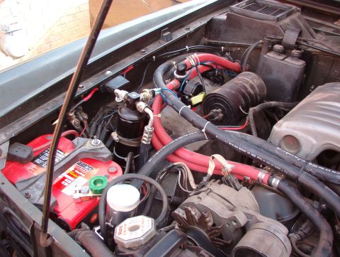 1975 Ford Bronco - He has the battery going to the starter relay (correct), but then ALL the vehicle power goes thru a 30A (pitiful) maxifuse inside that blac…
