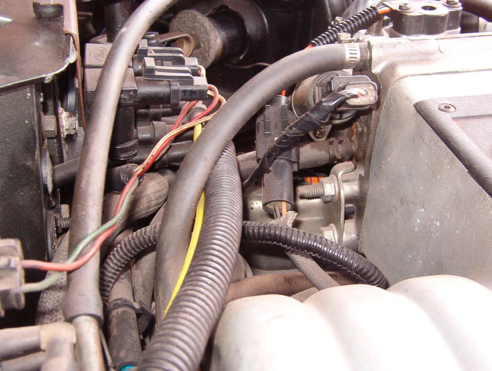 This & the next photo show how I flipped the IAC by rearranging the throttle heater nipples so the brake MC/power booster would fit.