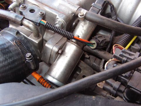 1975 Ford Bronco - This & the previous photo show how I flipped the IAC by rearranging the throttle heater nipples so the brake MC/power booster would fit.