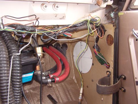 1975 Ford Bronco - Those red hoses... They're driving me NUTS!!! I'm putting some split-loom over them in here.