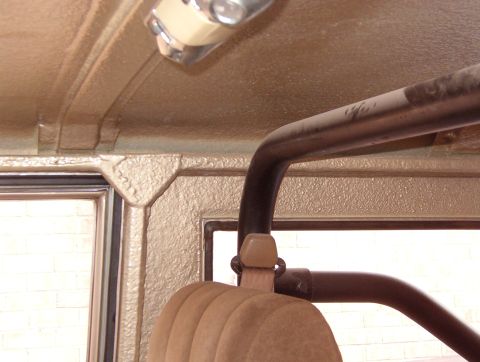 1975 Ford Bronco - The shoulder belts look & work great. One day, I'll build a headliner & install a nicer dome lamp.