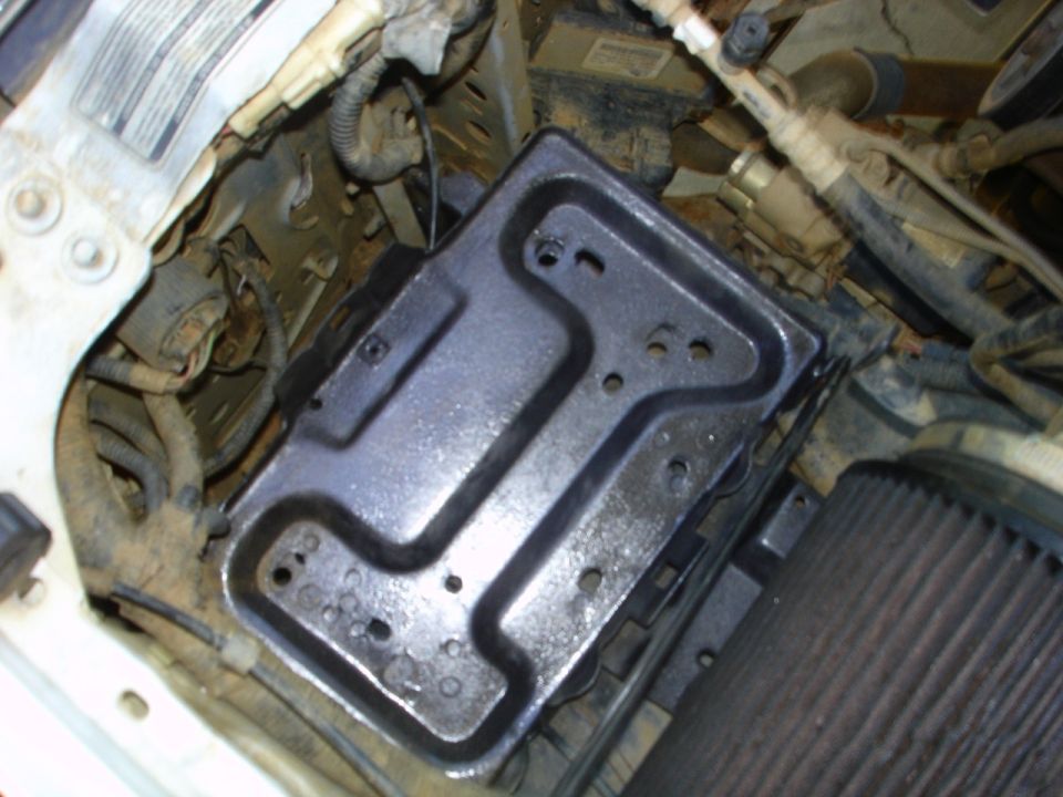 2nd battery tray bolted in the stock diesel position.