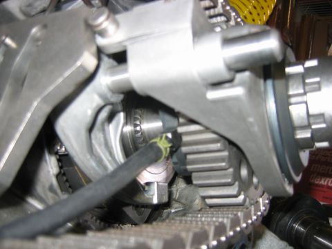 1992 Ford Bronco - Close-up of a partially disassembled gear-driven mechanism, likely an engine timing or transmission assembly, showing bearings, gear teeth,…