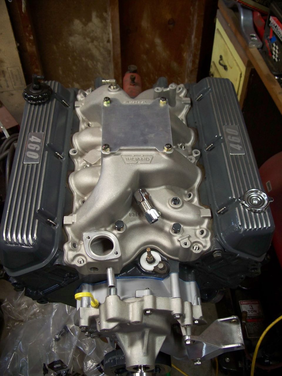 Ford 460 big-block with Weiand aluminum intake and finned 460 valve covers on a stand