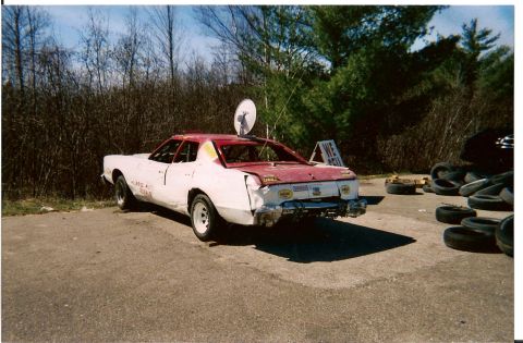 1977 Mercury Cougar - Modified 1977 Mercury Cougar prepared for demolition derby, showing damage to the rear.