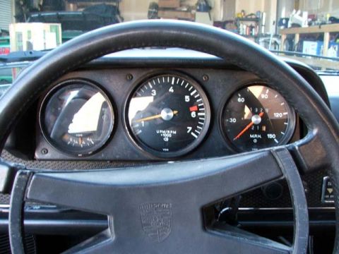 1974 Porsche 914 - Dashboard view of a 1974 Porsche 914, showing the tachometer, speedometer, and oil pressure gauge.