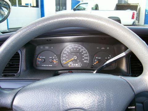 2001 Ford Crown Victoria - Interior view of a 2001 Ford Crown Victoria, with a white pickup truck seen through the windshield.