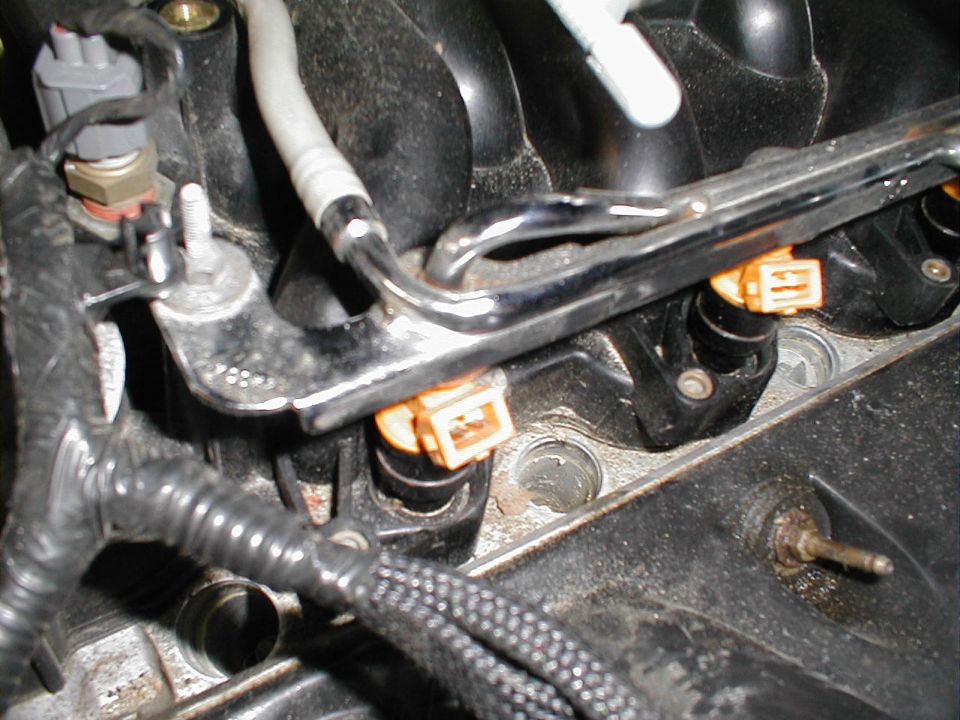 Engine intake manifold with fuel injectors and wiring harness
