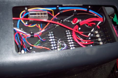 2002 Chevrolet Suburban - This image shows a detailed view of a vehicle's internal wiring harness, numerous colorful wires and electrical components.