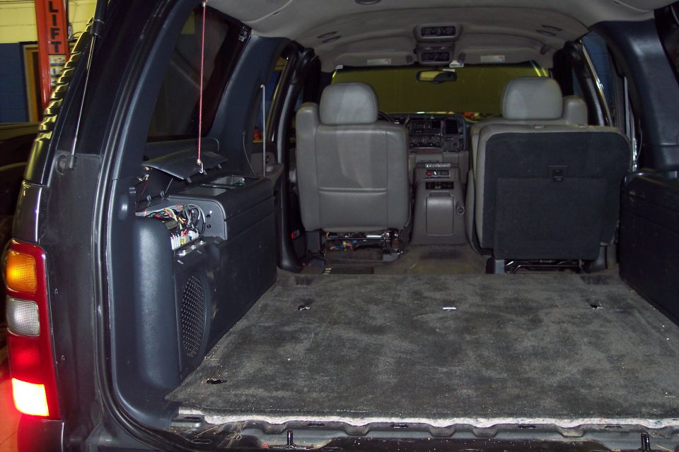 2002 Chevrolet Suburban interior, rear cargo area carpeted, second row seats installed, third row removed