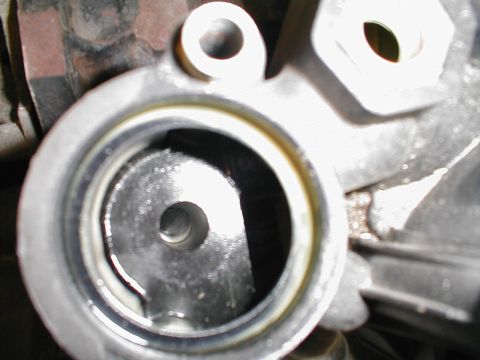 1997 Ford Crown Victoria - A close-up view of an engine part, possibly related to an intake system, with visible internal components.