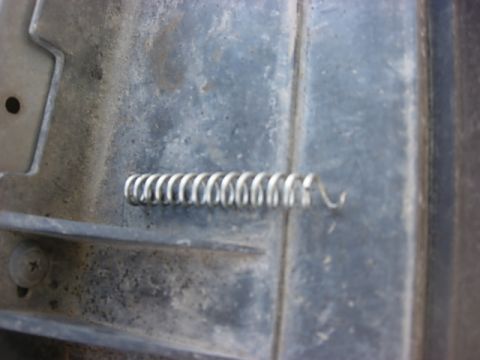 1987 Ford Bronco - the GM had much less cable inside the drum so I removed some of the spring around the cable.