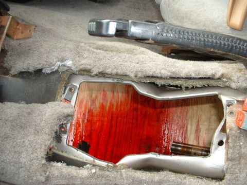 1989 Ford Thunderbird - Buckled transmission tunnel.
