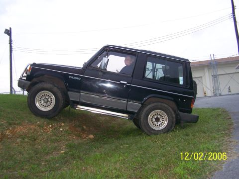 1989 Mitsubishi Montero - my wife in the passenger seat yeah its a right hand drive truck kinda odd to 4wheel at first but you get used to it