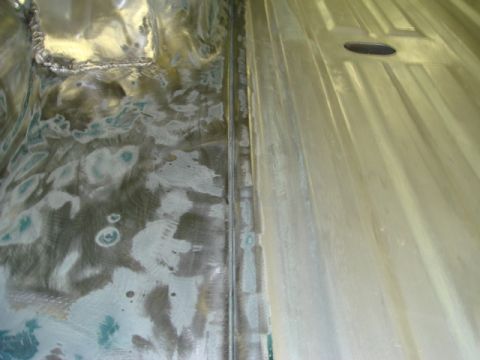 1996 Ford Bronco - The left floor seam.