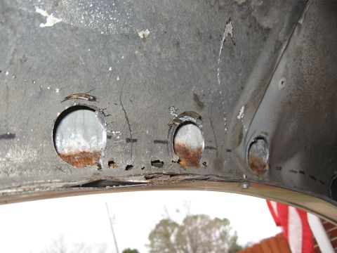 1994 Ford Bronco - I cut 6ea. 1 3/8" holes in the wheel house for future cleaning of the wheel well.