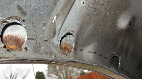 1994 Ford Bronco - Between the second and third hole there is an indention Ford made this indention on both sides of the wheel well. Once the dirt gets betwee…