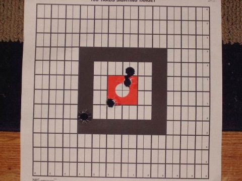 1985 Ford Bronco - A sighting target shows bullet impacts, with the Supermotors.net logo visible at the bottom.