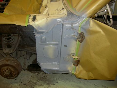 1967 Ford Ranchero - Car body section masked and primed during repair work.