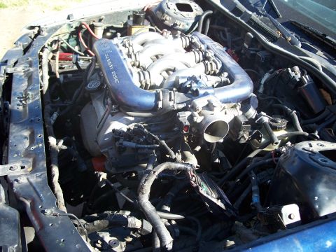 1992 Ford Taurus - Engine bay with V6 24-valve DOHC engine, intake manifold, and throttle body visible.