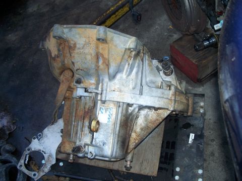1992 Ford Taurus - Close-up of a used automatic transmission, likely removed from a vehicle for repair or replacement.