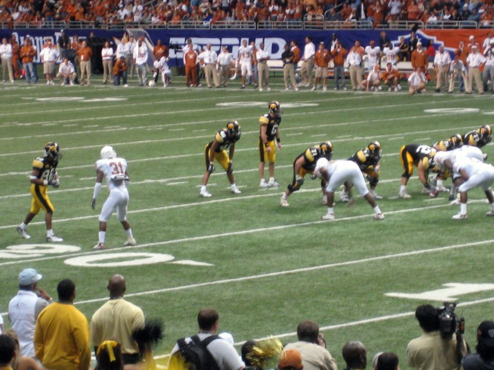 football players lined up on field