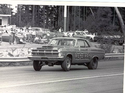 1967 Ford Fairlane - A 1966 drag racing car, labeled "DEPENDABLE", competes on a track with spectators in the background.