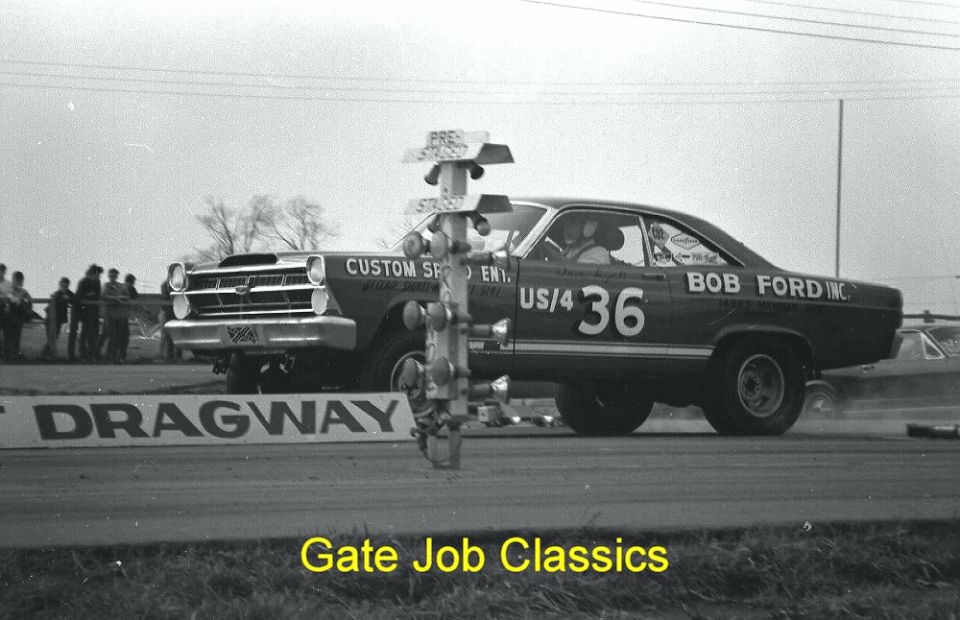 Vintage 1960s Ford Fairlane drag car #36 launching with front wheels up at a dragway