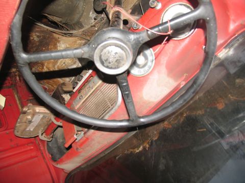 1952 Ford Pickup - Interior view of a 1952 Ford Pickup, focusing on the steering wheel and dashboard area.