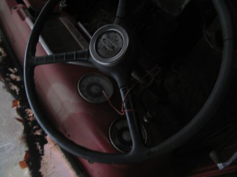 1952 Ford Pickup - The interior of a 1952 Ford Pickup, its steering wheel and dashboard gauges.