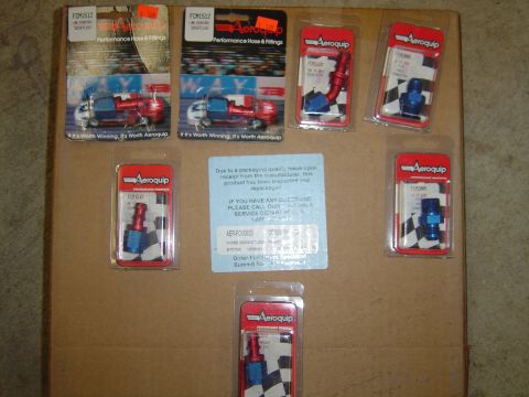 1978 Ford Bronco - Collection of Aeromotive hose fittings in their original packaging, some a checkered flag design.