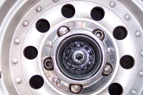 1996 Ford Bronco - A detailed view of a manual locking hub, a component often found on older four-wheel-drive vehicles.
