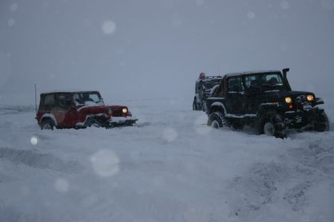 2003 Jeep TJ - Two Jeeps navigate deep snow on Knik Glacier on January 1, 2007.