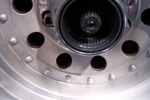 1996 Ford Bronco - This image shows a close-up of a manual hub, a component of a vehicle's drivetrain.