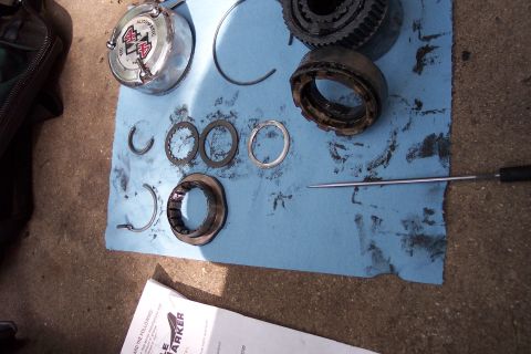 1996 Ford Bronco - Manual locking hub parts laid out for service or inspection.