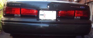 1997 Ford Crown Victoria - Rear view of a 1997 Ford Crown Victoria sedan, showing its distinctive taillight design.